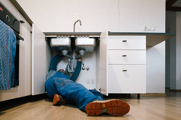 Professional Drain Cleaning technician working in Roswell, GA